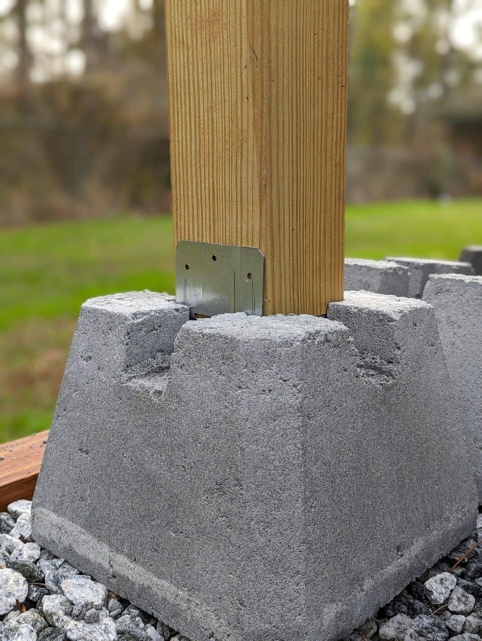 cement fence post base