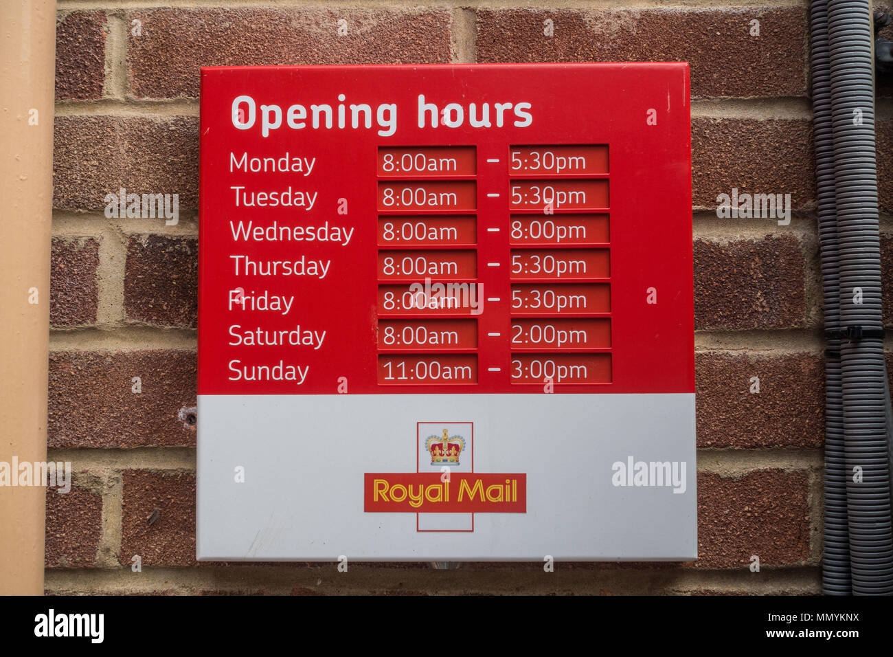 A Sign Detailing Opening Times Of The Queen Elizabeth Royal Mail Delivery Office In Windsor UK Stock Photo Alamy