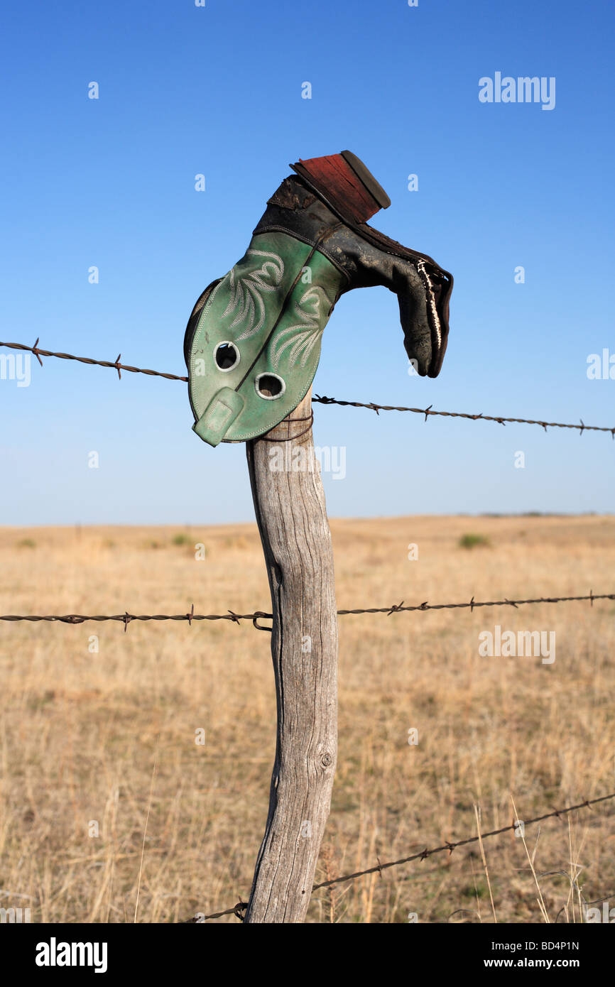 An Upside Down Cowboy Boot On A Ranch Fence In Rural Nebraska USA Stock Photo Alamy