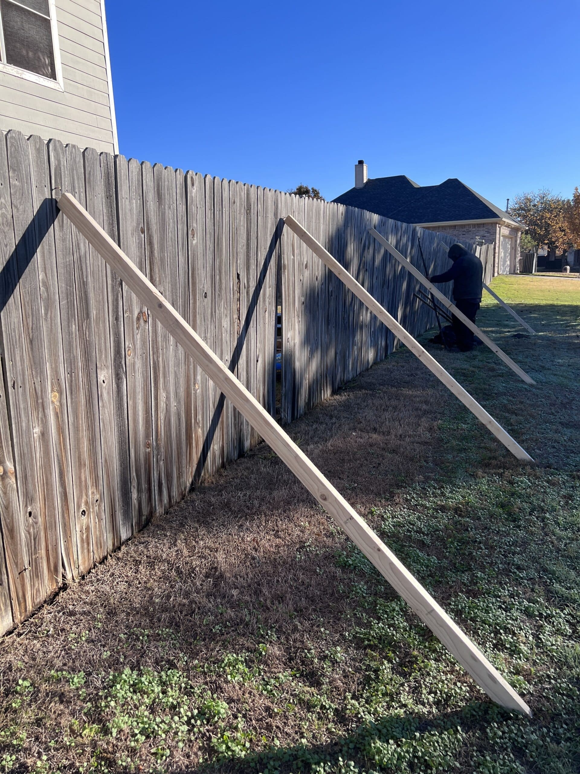how to fix leaning fence post