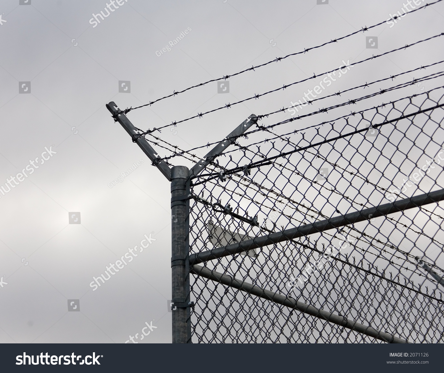 Corner Post Chain link Fence Topped Barbed Stock Photo 2071126 Shutterstock