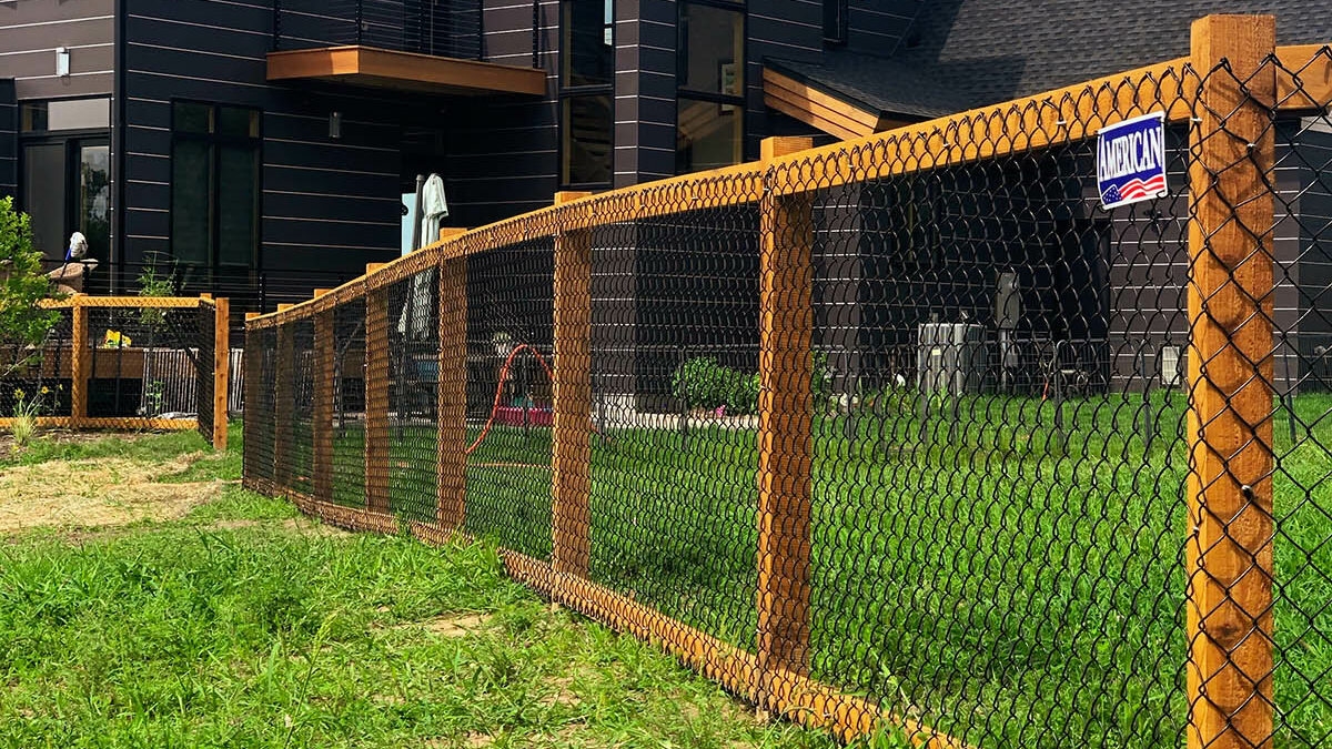 wood post and chain link fence