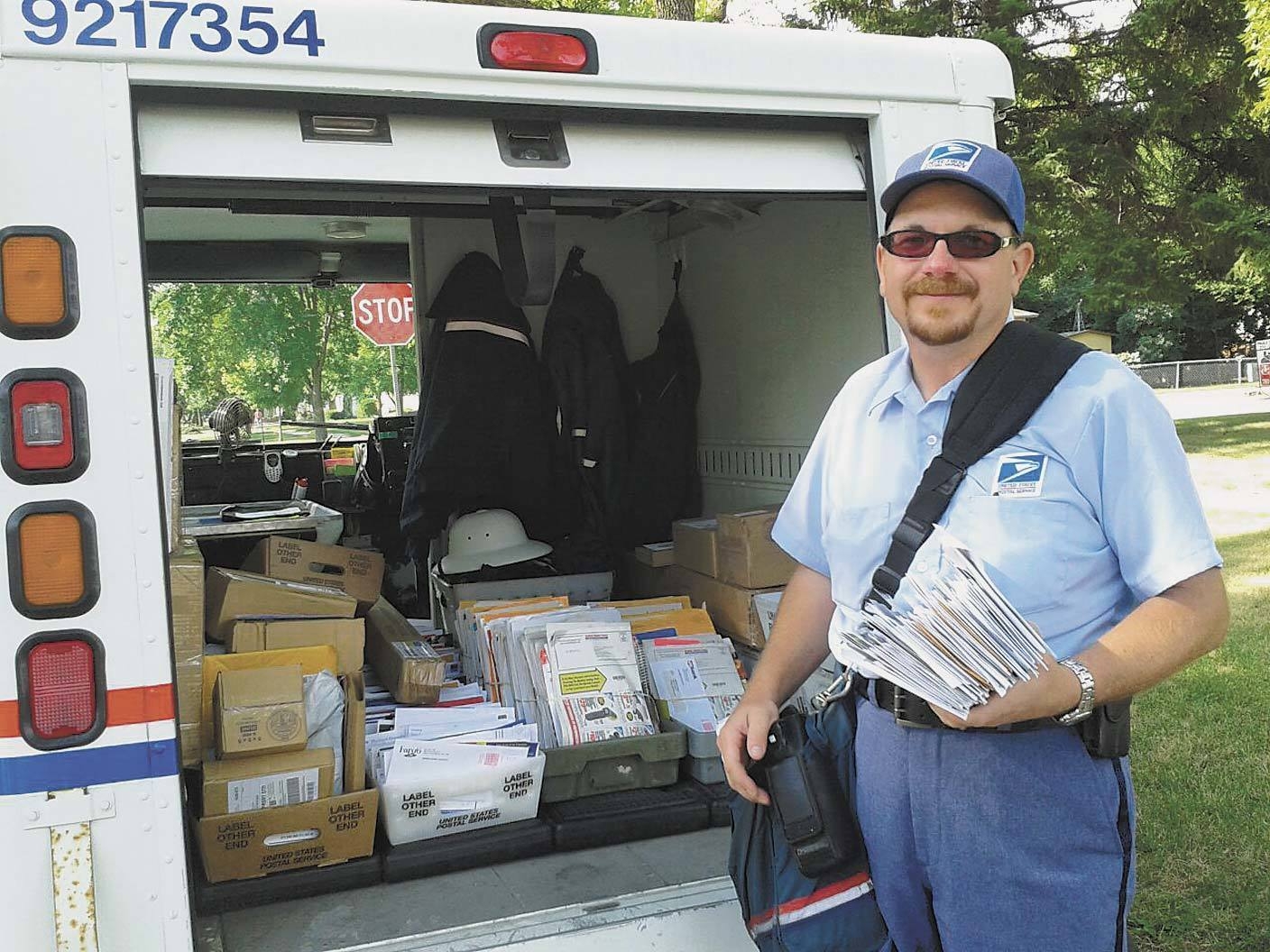 USPS Carrier Walks His Route To Deliver The Mail InForum Fargo Moorhead And West Fargo News Weather And Sports