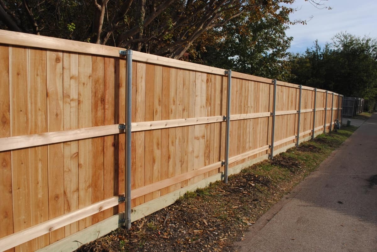 wood fences with metal posts