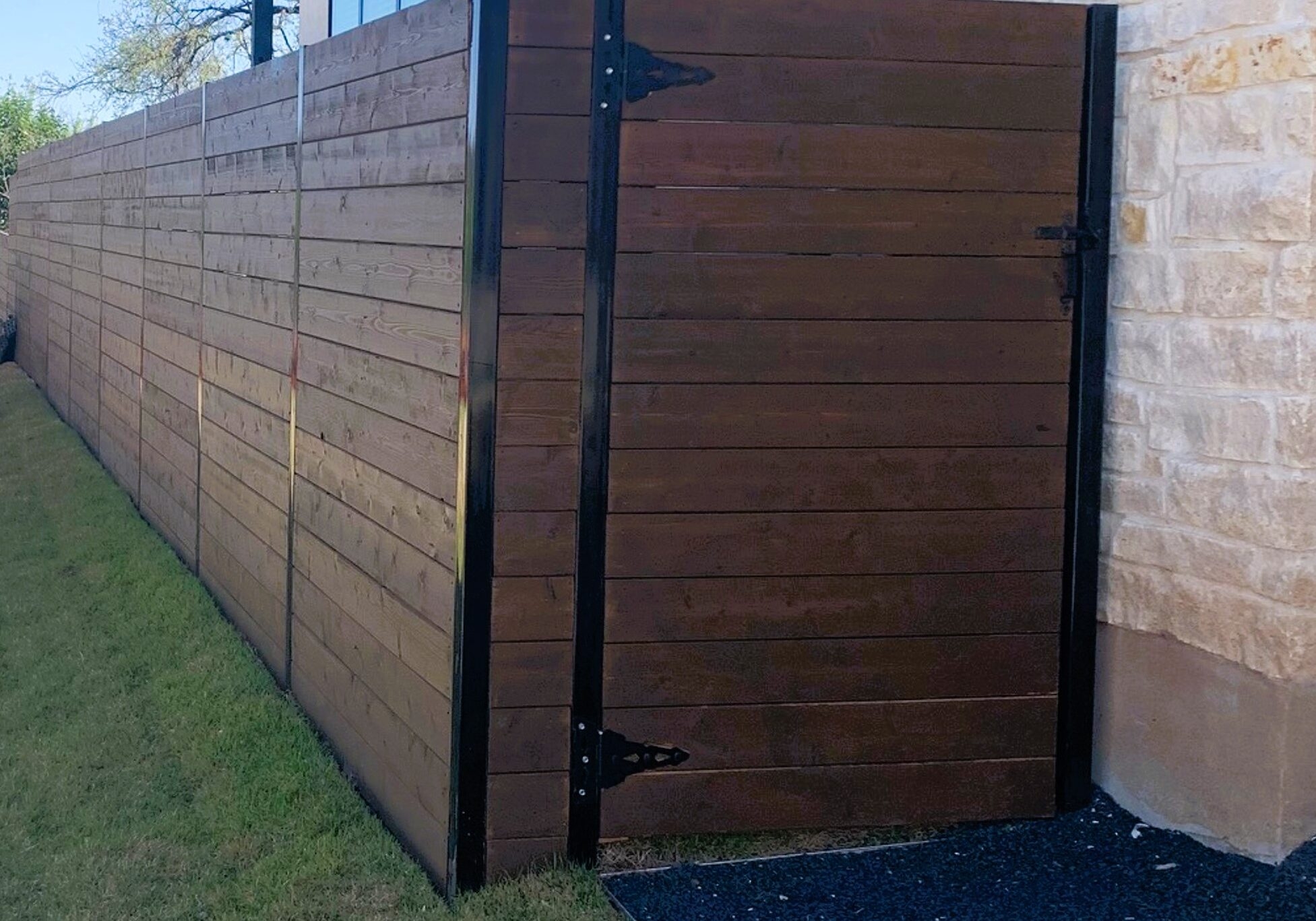 metal post and wood fence