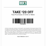 Teacher organizing coupon printables in binder