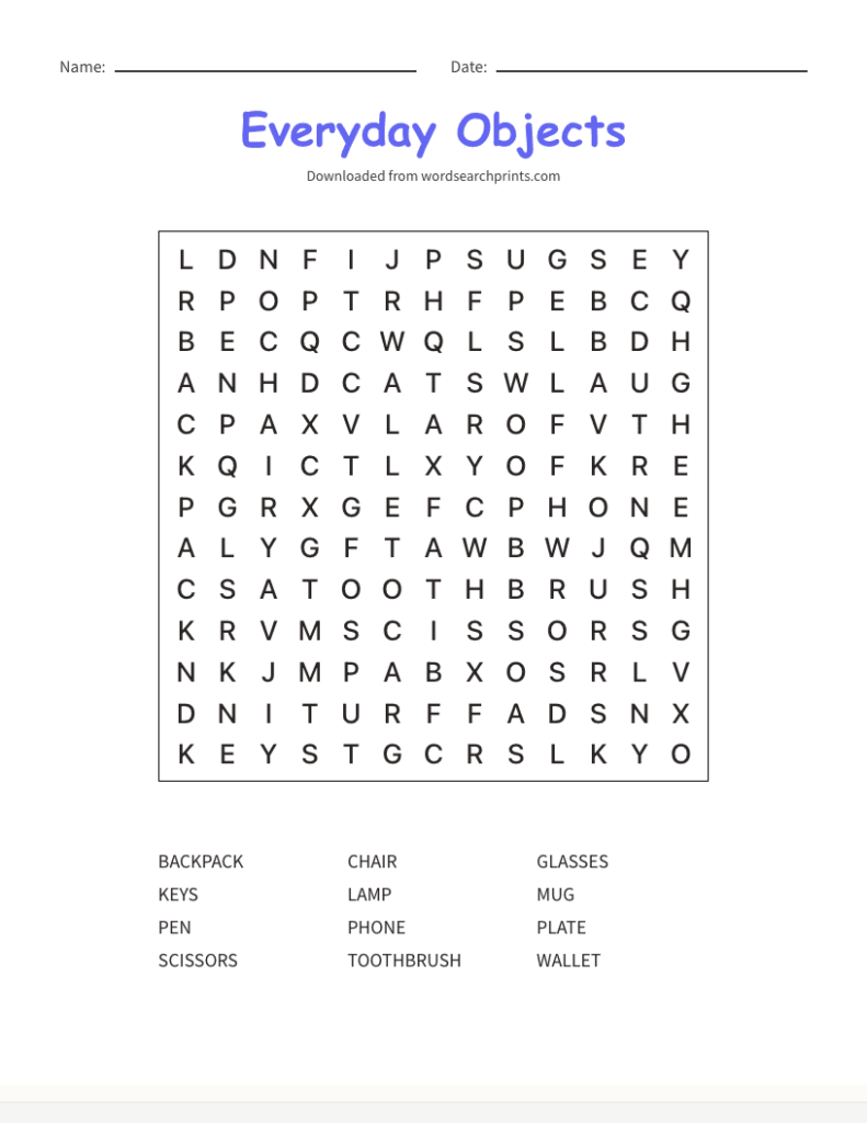 teacher's hands arranging a printable literacy center setup